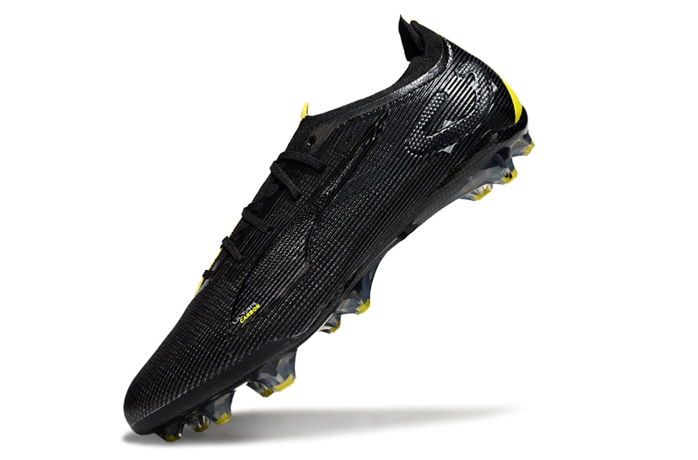 Chuteira Puma Ultra 5 Carbon FG - Preto/Amarelo
