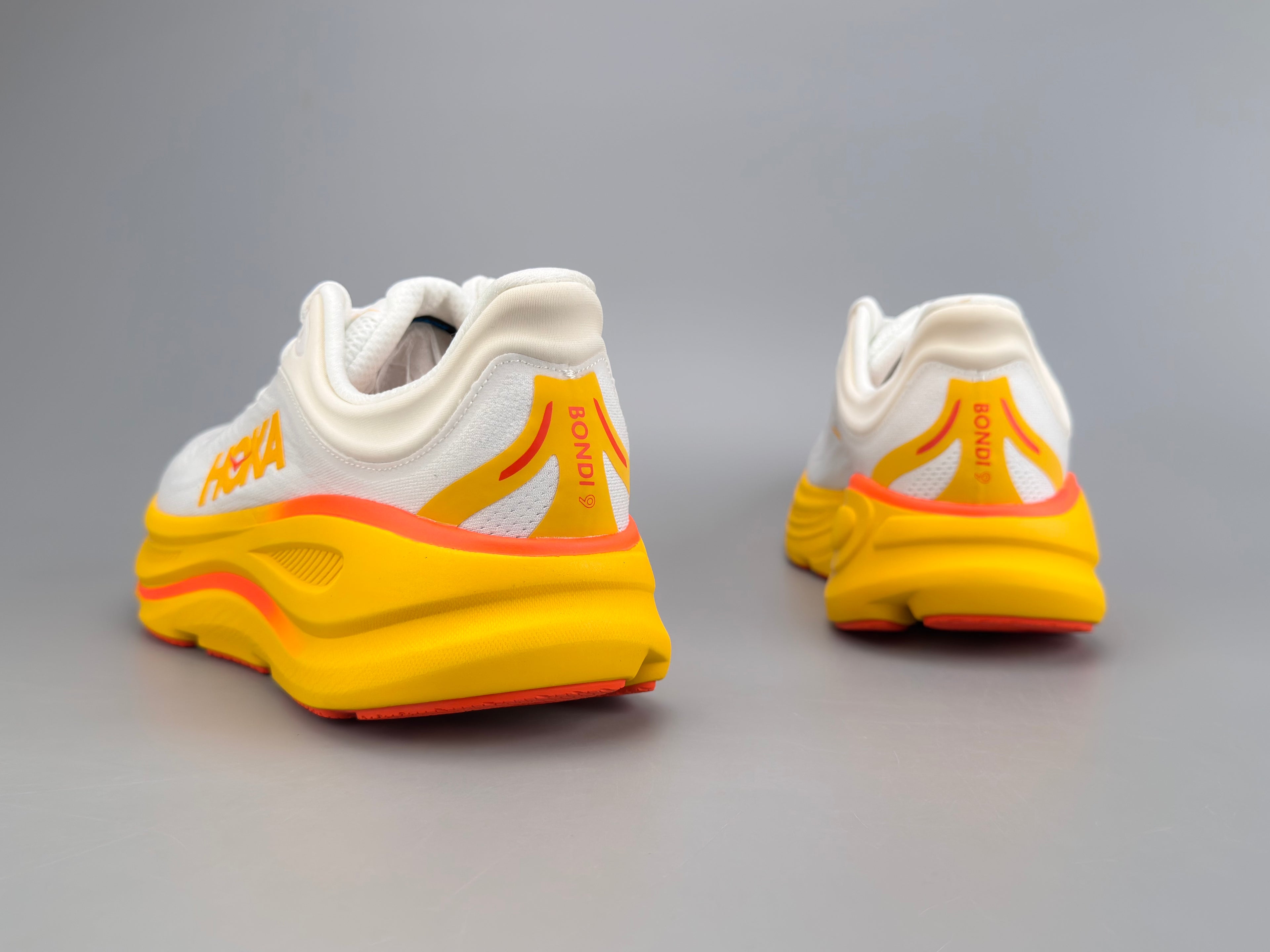 Tênis Masculino Hoka Bondi 9 - Branco e Amarelo