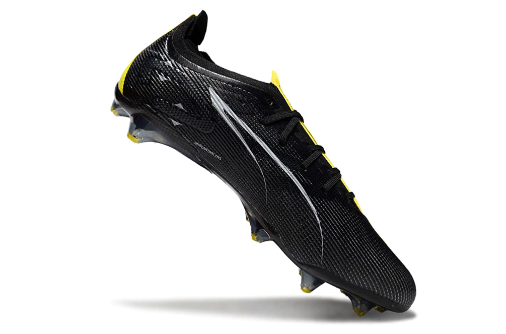 Chuteira Puma Ultra 5 Carbon FG - Preto/Amarelo
